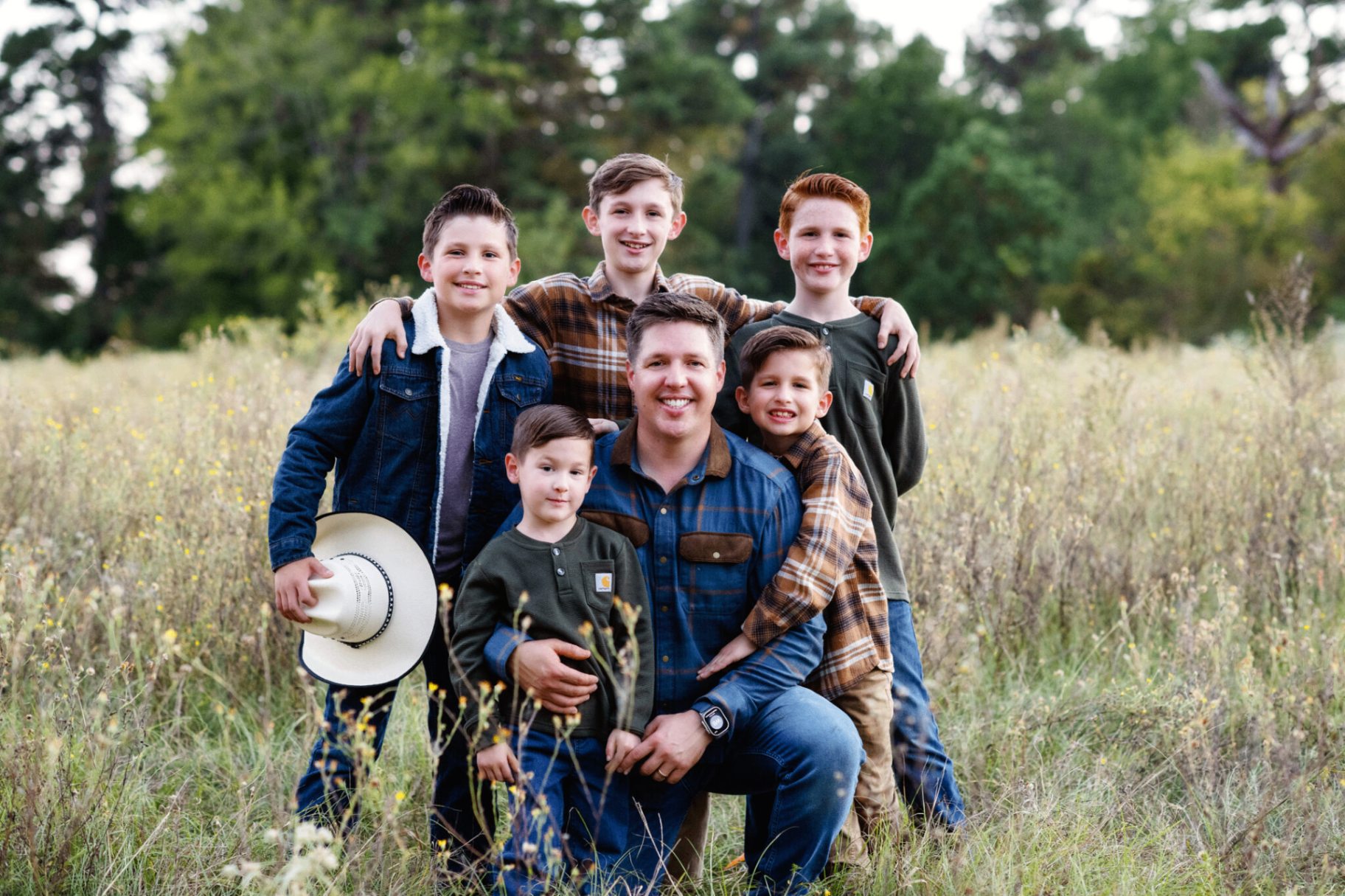 Phillip Jordan and his five sons in a Texas field